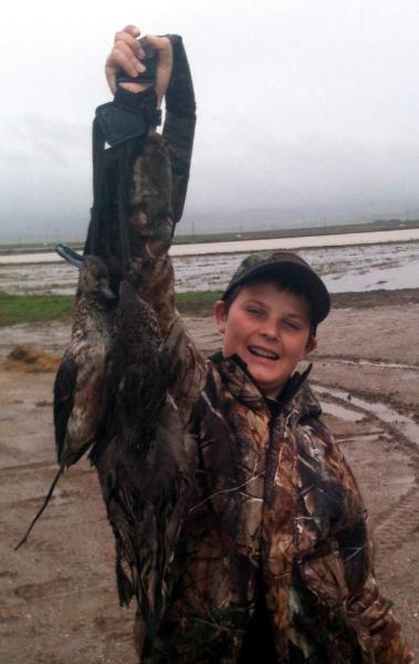 Devon Alexander with his first duck, December 2012 (3 green-winged teal and 1 pintail)